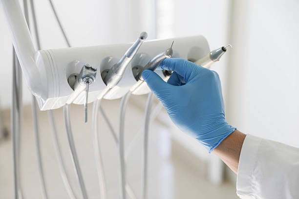 Professional Emergency Dentist technician working in Ashtabula County County, OH